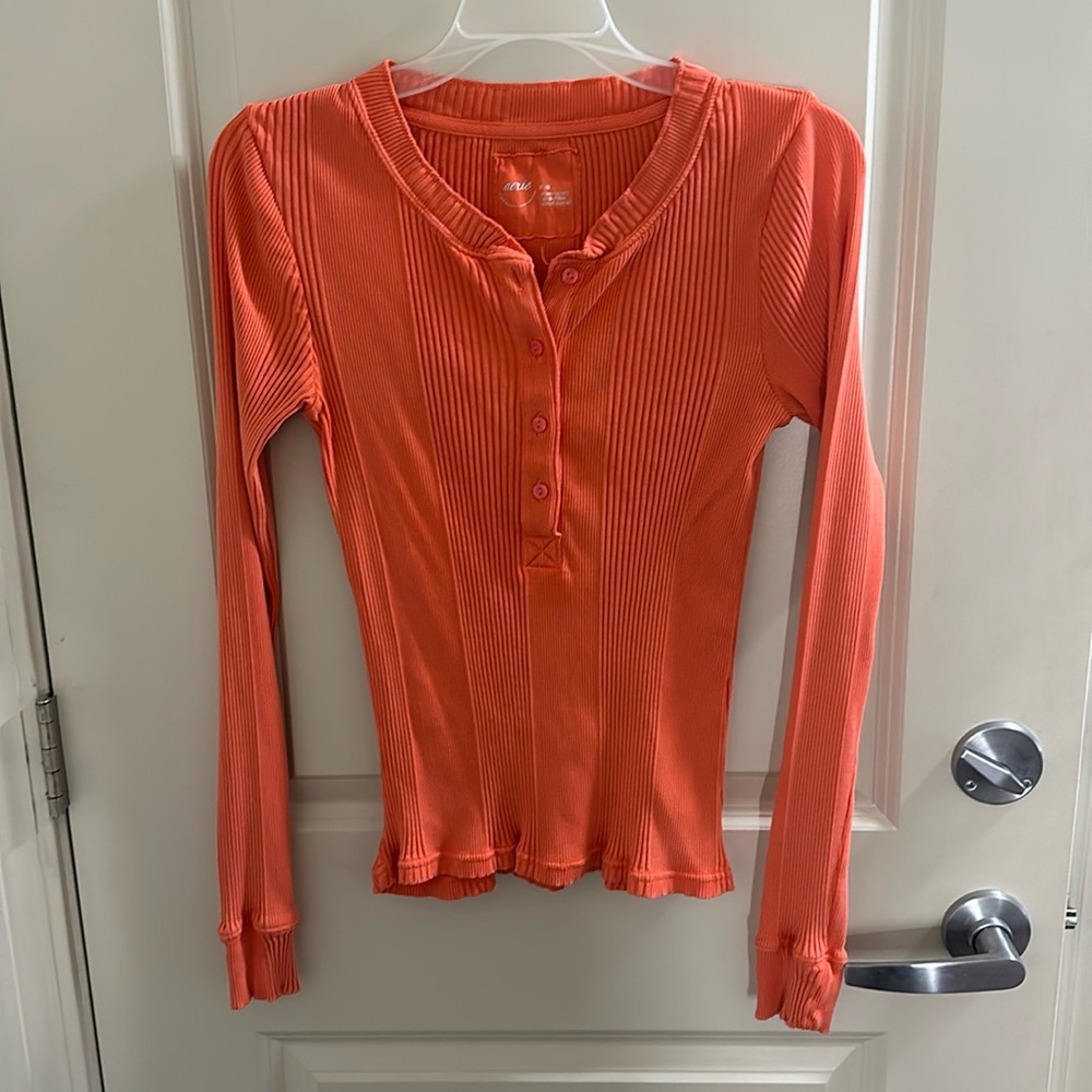 Orange long sleeve, button up shirt